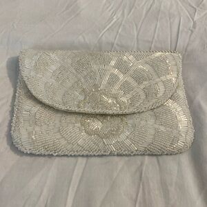 Beautiful white beaded clutch works also for a shoulder bag